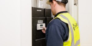 Engineer setting energy meter